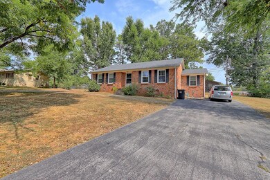 The all-brick one level,  has paved driveway for each unit. Each unit features LR/Kitchen/1 bath/ 2 bedrooms. 