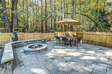 View of patio featuring a fire pit
