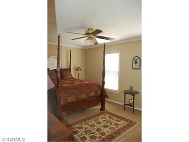 Master Bedroom - Ceiling fan, berber carpet