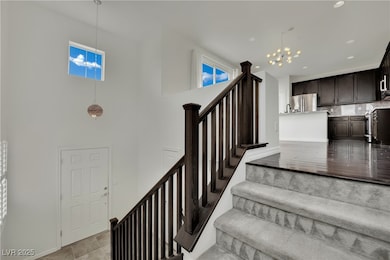 *Front door and flight of stairs to second level.