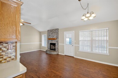 Unfurnished living room featuring lofted ceiling,