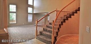 photo 6 Stairway & Living Room