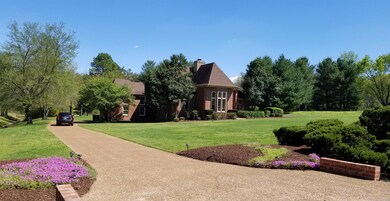 Home sets back from road