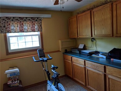 Lower level office with builts in cabinets