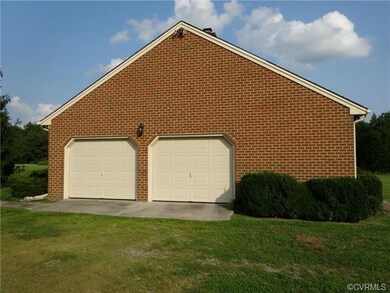 2-car attached garage with storage area or small w
