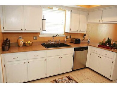 Kitchen. Kitchen tile flooring has also been updat