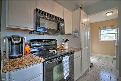 Galley-style kitchen with new granite countertops!