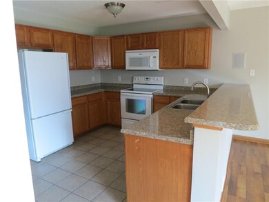 Kitchen and breakfast bar