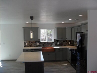 311 N Henry St, Cortez, CO 81321 - photo 6