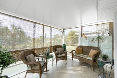 Tropical relaxation on your spacious 10' x 13' screened porch.