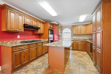 Massive kitchen with new cabinets and granite coun