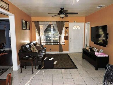Living room with beautiful tile floors & dual pane