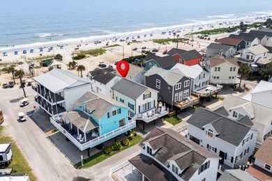 Birds eye view of property with a beach view and a