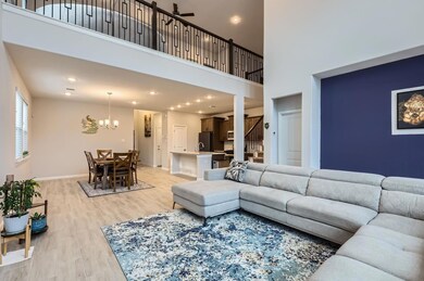 Living area featuring light wood-type flooring, a