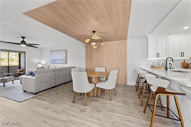 Dining space featuring wood ceiling, sink, vaulted