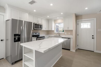 New Cabinets, quartz counters, all new appliances