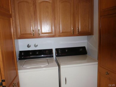 Washer and dryer remain, note the cabinets in the 