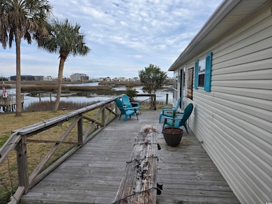 Deck featuring a water view