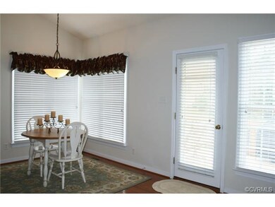 Large, bright Breakfast Area also has door to deck