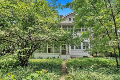 There's another 75' of backyard still behind the camera! The sunroom on left is not part of the posted sq ft.