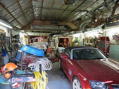 Exterior Front. Interior of the garage.