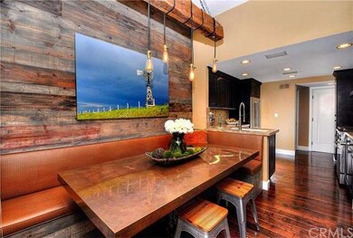 Copper Dining Room Table With Custom Booth Seating
