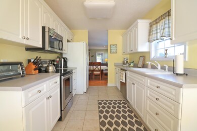 Bright Kitchen with Plenty of Cabinets!