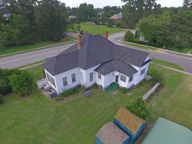 Aerial of back of Cameron house