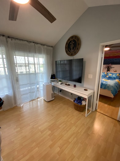 Living room area with access to lanai