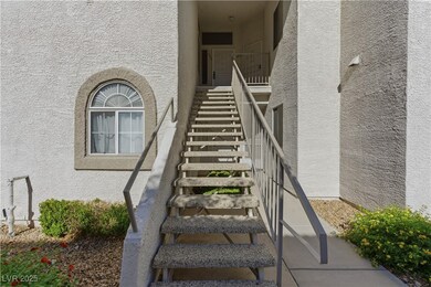 Doorway to property with stucco siding