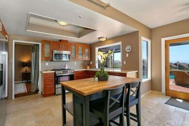 With a gourmet kitchen with top of the line applia