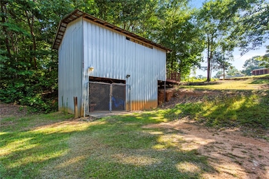 The outbuilding is perfect storage or lake gear an
