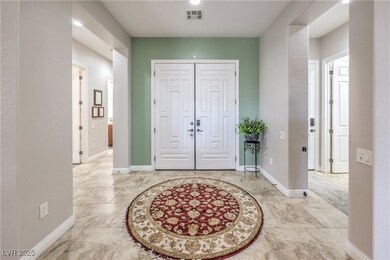 Foyer featuring visible vents and baseboards
