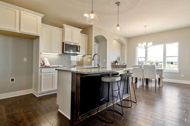 Island open to Dining and Living Areas