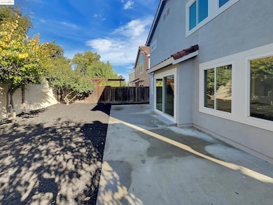 Fenced backyard featuring a patio