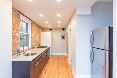 1122 W Addison St unit GDN, Chicago, IL 60613 - photo 3