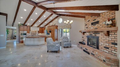 Brick fplc and beamed ceilings
