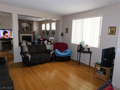 Enter into this formal living area w/custom floori
