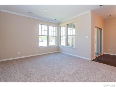 Family Room and covered patio. Hard wood flooring 