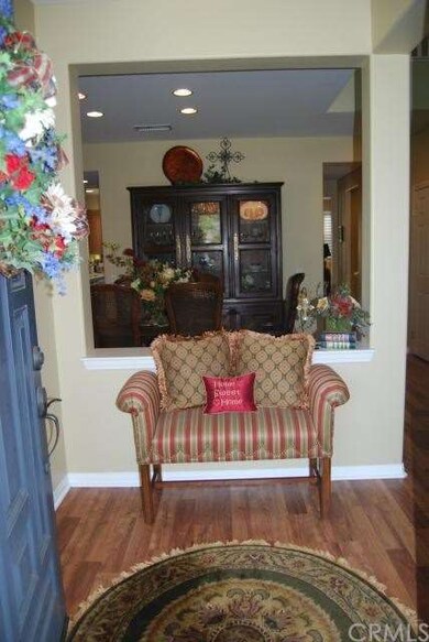 Enter into this lovely foyer with open formal dini