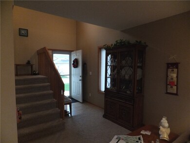 Ceramic tile in the foyer and all new carpet on 1s