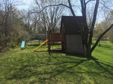 Playhouse and swing set