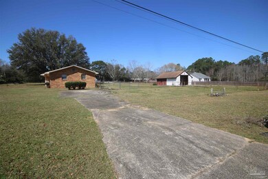 add a detached garage at the end of the driveway.