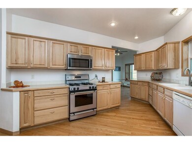 Hickory cabinets and hardwood flooring.