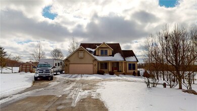 Front exterior view of house and driveway