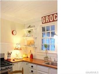 Next, step into the bright country kitchen with wi