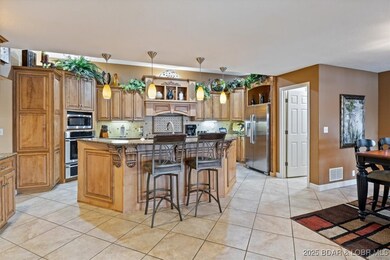 135 W Windy Cove Ln, Roach, MO 65787 - photo 5