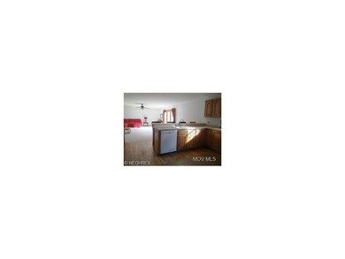 Kitchen opens into Living Room