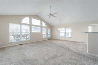 Open Floor plan with beautiful wall of windows.