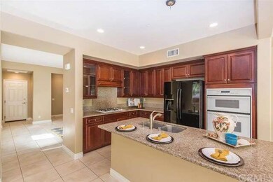 Beautiful kitchen with wood cabinets and stunning 
